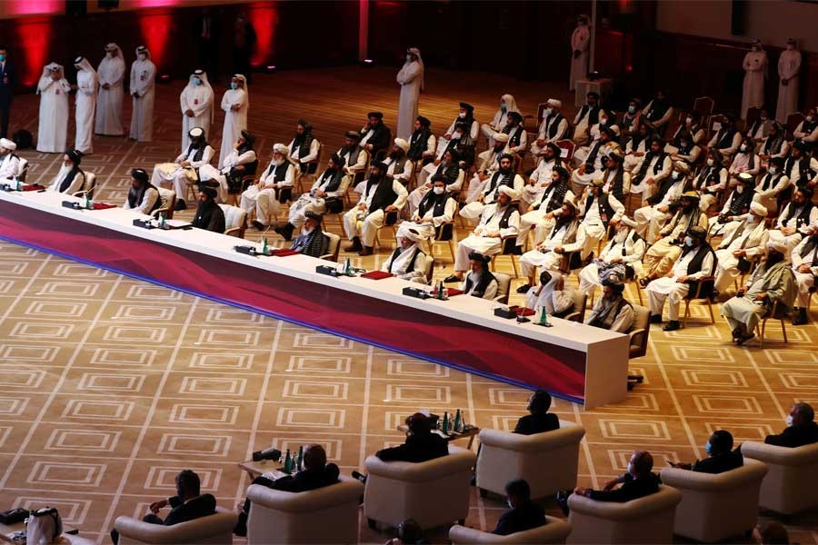 Delegates attending talks between the Afghan government and Taliban insurgents in Doha, Qatar on September 12 –Reuters Photo