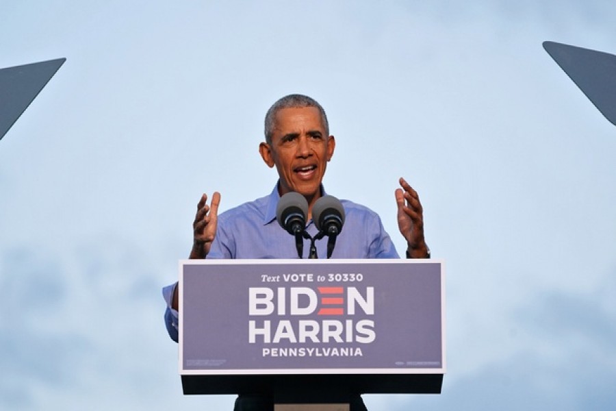 Former US President Barack Obama gestures as he campaigns on behalf of Democratic presidential nominee and his former Vice President Joe Biden in Philadelphia, Pennsylvania, US, October 21, 2020 — Reuters