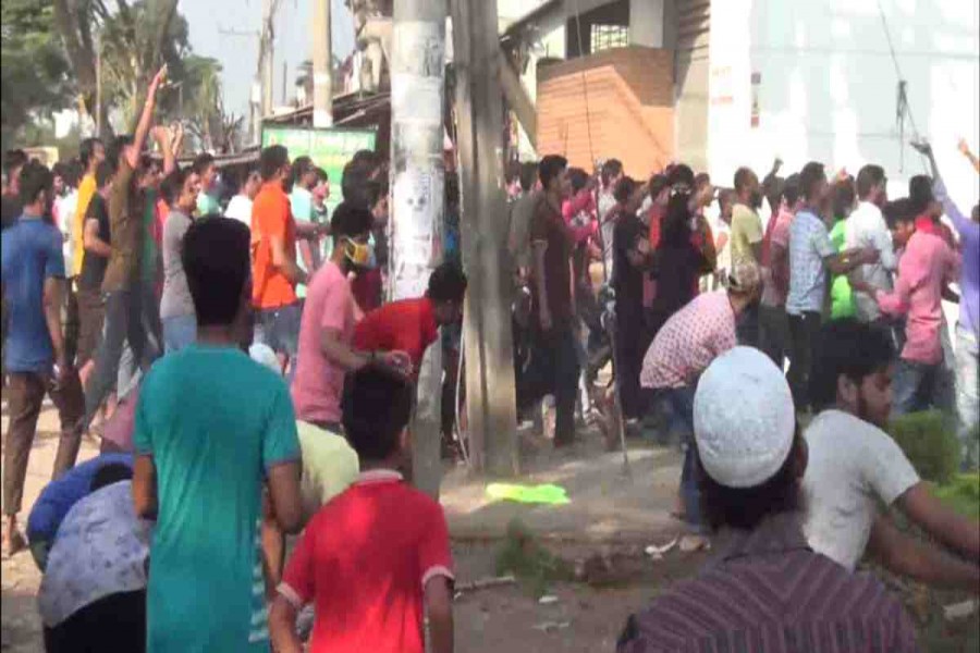 Gazipur sweater factory workers block road protesting retrenchment