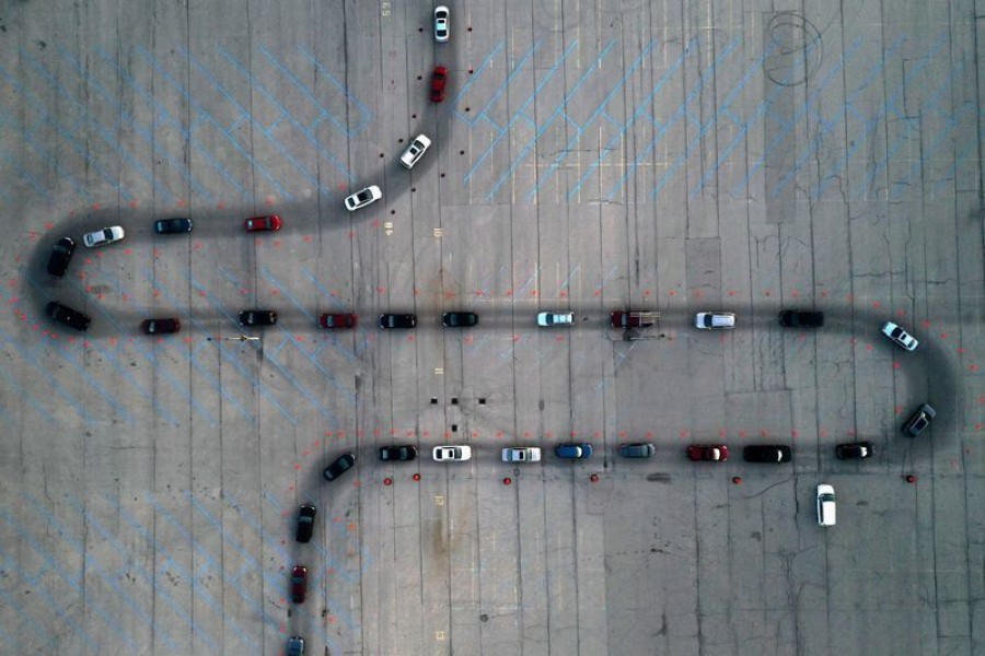 An aerial view of vehicles waiting at a drive-thru Covid-19 testing site in the parking lot of Miller Park, as the coronavirus (Covid-19) disease outbreak continues in Milwaukee, Wisconsin, US on November 5, 2020. Picture taken with a drone — Reuters/Files