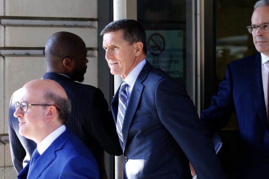 Former U.S. National Security Adviser Michael Flynn departs US District Court, where he was expected to plead guilty to lying to the FBI about his contacts with Russia's ambassador to the United States, in Washington, US, December 1, 2017. REUTERS/Jonathan Ernst