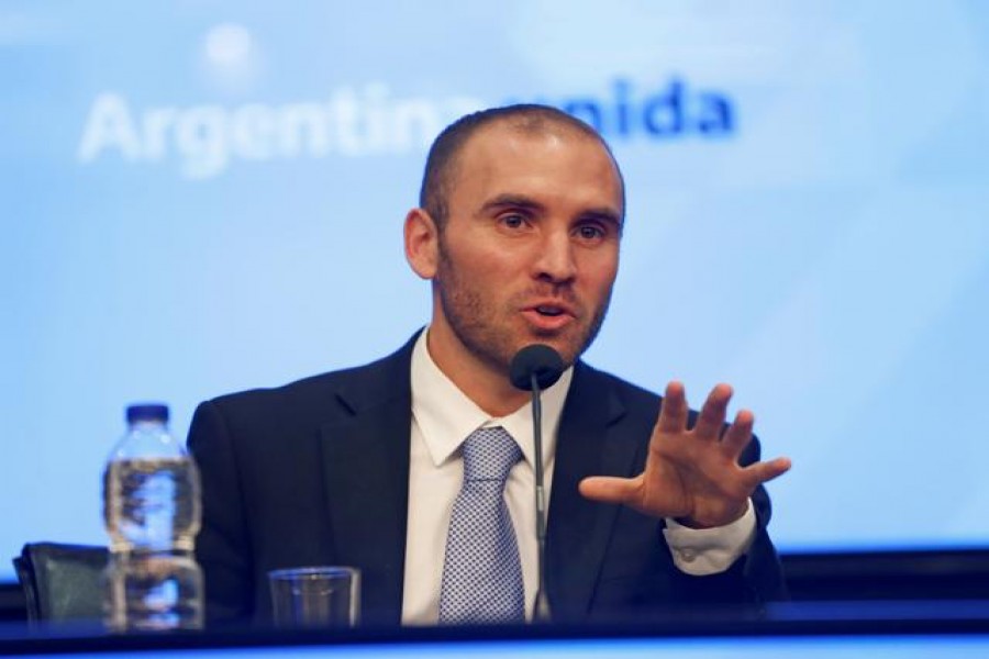 FILE PHOTO: Argentina's Economy Minister Martin Guzman attends a news conference in Buenos Aires, Argentina December 11, 2019. REUTERS/Mariana Greif/File Photo