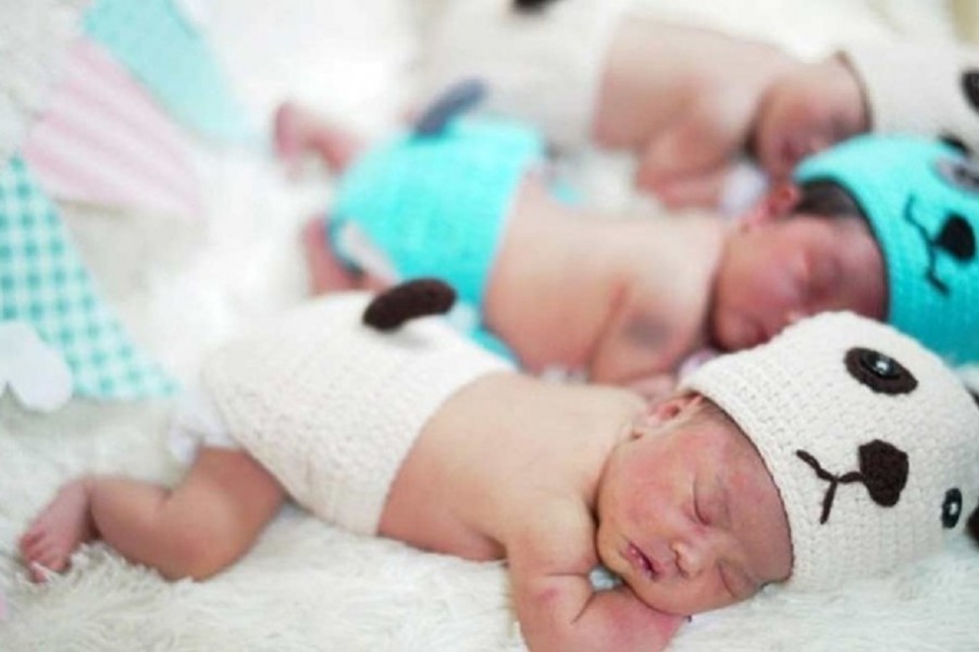 Newborn babies wearing dog costumes to celebrate the New Year of the Dog are pictured at the nursery room of Paolo Chokchai 4 Hospital in Bangkok, Thailand, December 28, 2017. REUTERS