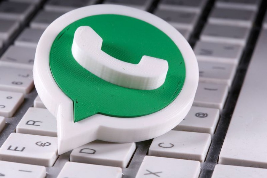 A 3D printed Whatsapp logo is placed on the keyboard in this illustration taken April on 12, 2020 — Reuters/Files