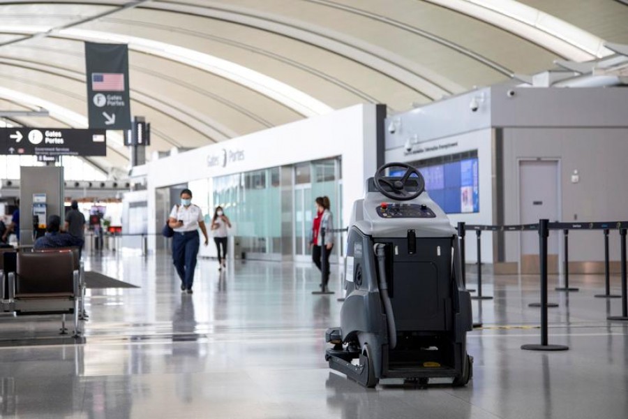 An autonomous floor cleaning machine cleans terminal 1 as a "Healthy Airport" initiative is launched for travel, taking into account social distancing protocols to slow the spread of the coronavirus disease (Covid-19) at Toronto Pearson International Airport in Toronto, Ontario, Canada on June 23, 2020 — Reuters/Files