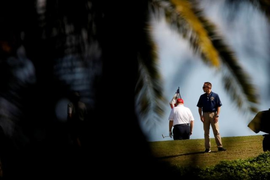 US President Donald Trump plays golf at the Trump National Golf Club in West Palm Beach, Florida, US, December 27, 2020. REUTERS/Marco Bello