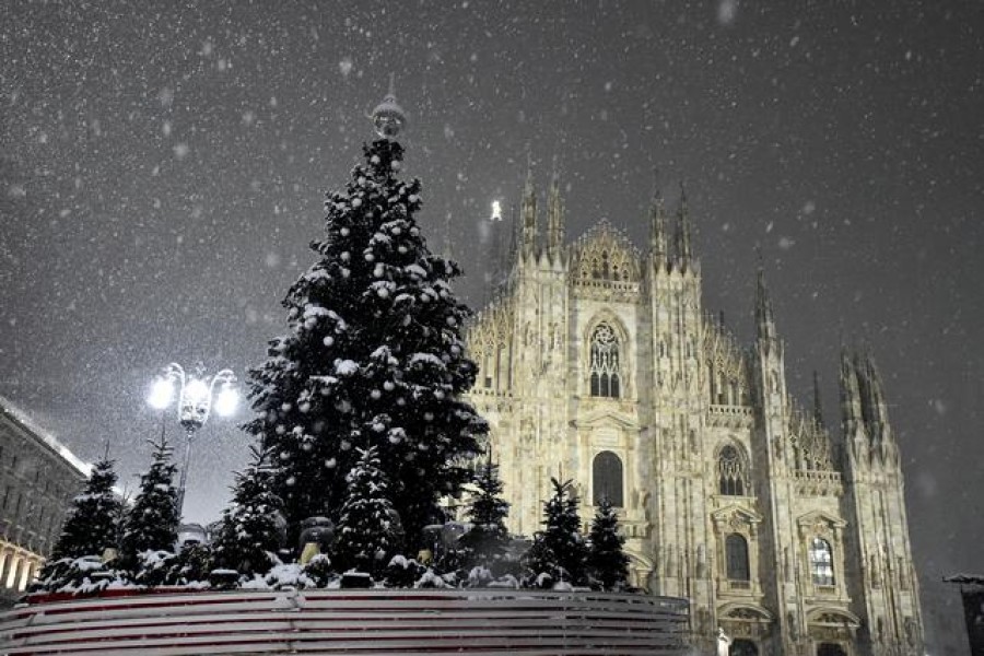 Snowfall blankets locked-down Milan