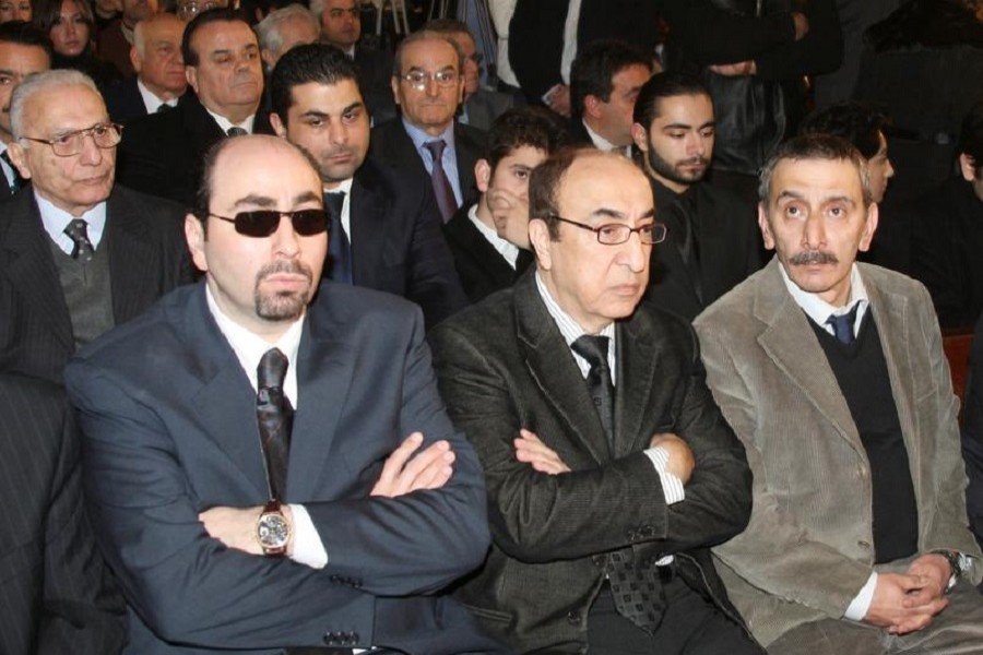 (L-R) Lebanese musicians and composers Ousama Rahbani, Elias Rahbani and Ziad Rahbani attend the funeral of composer, musician and producer Mansour Rahbani in Beirut January 16, 2009 — Reuters/Files