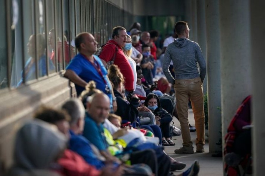 People line up outside Kentucky Career Center prior to its opening to find assistance with their unemployment claims in Frankfort, Kentucky, US on June 18, 2020 — Reuters/Files