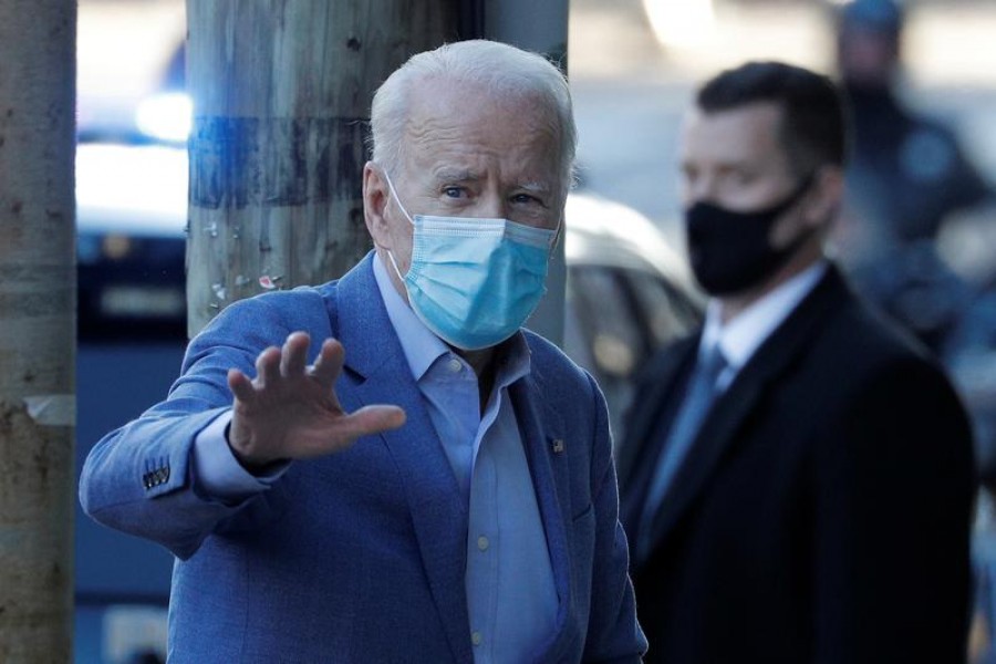 US President-elect Joe Biden walks into the Queen Theatre in Wilmington, Delaware, US, January 10, 2021 — Reuters/Files