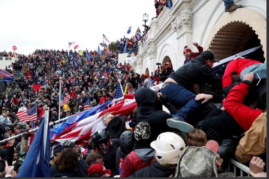 Pro-Trump protesters storm into the US Capitol during a rally to contest the certification of the presidential election results, January 06, 2020. REUTERS/Shannon Stapleton