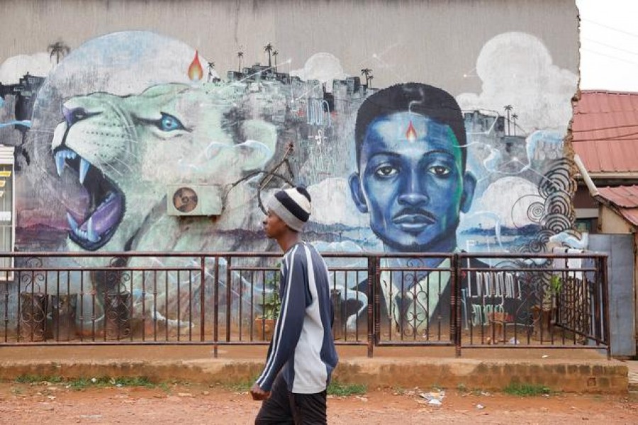 A man walks past a graffiti of Ugandan opposition presidential candidate Robert Kyagulanyi, also known as Bobi Wine, in Kampala, Uganda, January 17, 2021 — Reuters/Files