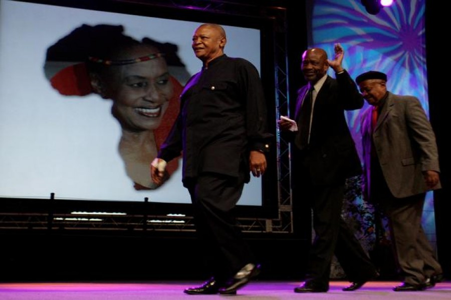 South African trumpeter Hugh Masekela (L), who was once married to singer Miriam Makeba, leaves with Caiphus Semenya and Jonas Gwangwa after paying tribute during Miriam Makeba?s memorial service in Johannesburg November 15, 2008. Reuters /Siphiwe Sibeko/File Photo