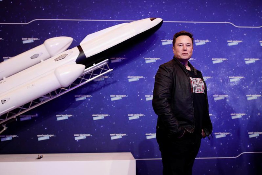 SpaceX owner and Tesla CEO Elon Musk poses after arriving on the red carpet for the Axel Springer award, in Berlin, Germany on December 1, 2020 — Pool via Reuters