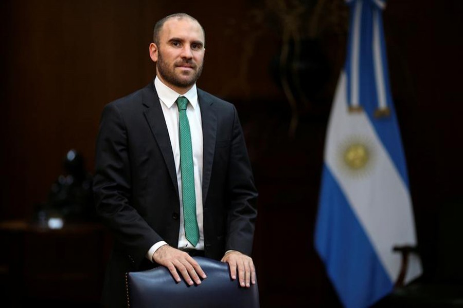 Argentina's Economy Minister Martin Guzman poses for a picture before an interview with Reuters at the Economy Ministry, in Buenos Aires, Argentina on December 10, 2020 — Reuters/Files