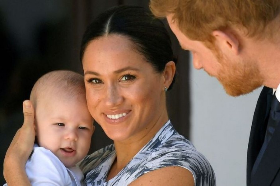 Britain's Prince Harry and his wife Meghan, Duchess of Sussex holding their son Archie, meet Archbishop Desmond Tutu (not pictured) at the Desmond & Leah Tutu Legacy Foundation in Cape Town, South Africa, September 25, 2019 — Reuters/Files