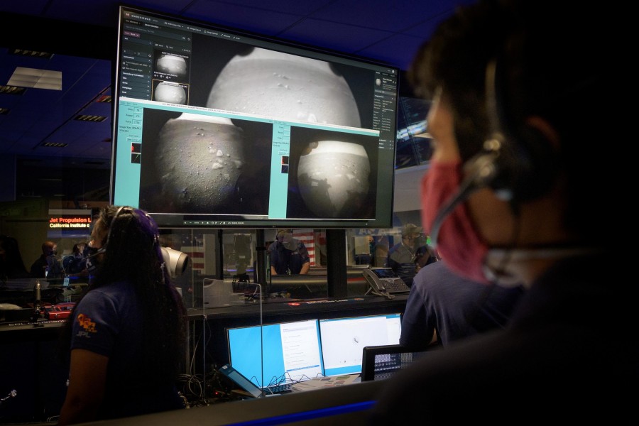 Members of NASA’s Perseverance Mars rover team watch in mission control as the first images arrive moments after the spacecraft successfully touched down on Mars, at NASA's Jet Propulsion Laboratory in Pasadena, California, US on February 18, 2021 — NASA Handout via REUTERS