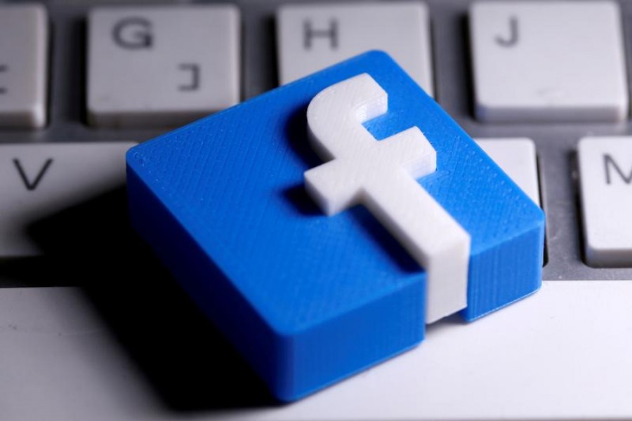 A 3D-printed Facebook logo is seen placed on a keyboard in this illustration taken March 25, 2020 — Reuters/Illustration