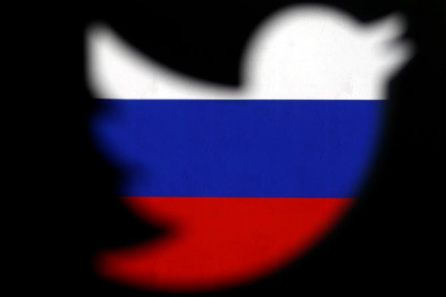 A 3D-printed Twitter logo displayed in front of Russian flag is seen in this illustration picture, October 27, 2017 — Reuters/Illustration