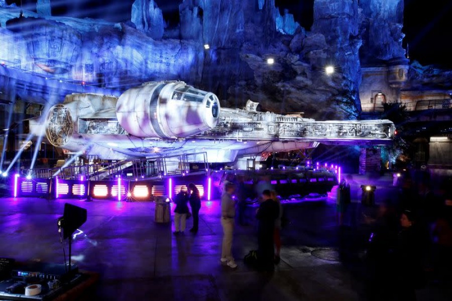 Guests explore "Star Wars: Galaxy's Edge" near a Millennium Falcon starship at Disneyland Park in Anaheim, California, US, May 29, 2019 — Reuters/Files