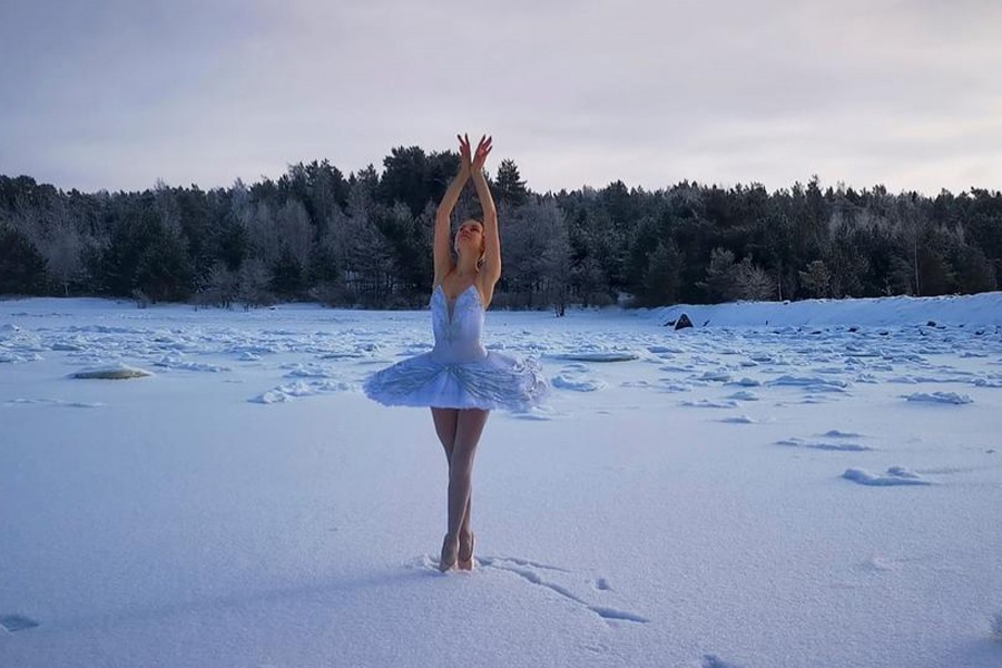 Ballet dancer from the Mariinsky Theatre Ilmira Bagautdinova performs on the ice of frozen Batareynaya Bay to protest the construction of a grain terminal and other infrastructure in the Gulf of Finland, in Leningrad region, Russia, in this still image taken from video released on February 20, 2021 — Ilmira Bagautdinova/Reuters TV via REUTERS