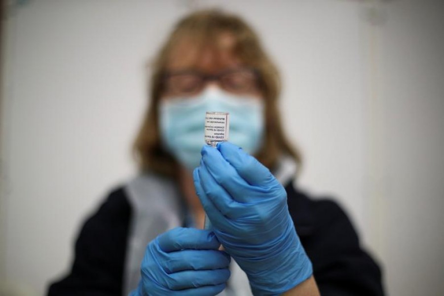 A healthcare worker prepares a doze of the Covid-19 vaccine, amid the outbreak of coronavirus (Covid-19) disease at the Derby Arena velodrome in Derby, Derbyshire, Britain on January 29, 2021 — Reuters/Files