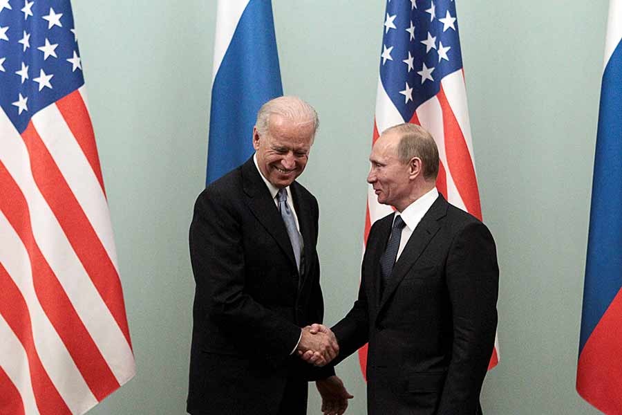 Then-US Vice President Joe Biden shaking hands with then-Russian Prime Minister Vladimir Putin during a meeting in Moscow in 2011 –Reuters file photo