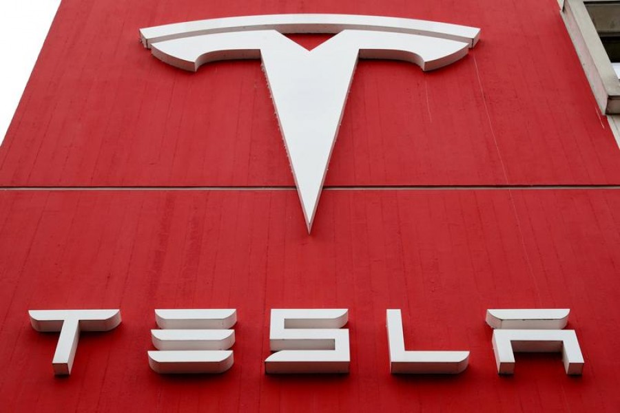 The logo of car manufacturer Tesla is seen at a branch office in Bern, Switzerland, October 28, 2020 — Reuters/Files