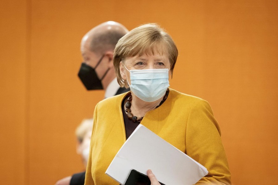 Merkel defends rollout as vaccine pressure grows