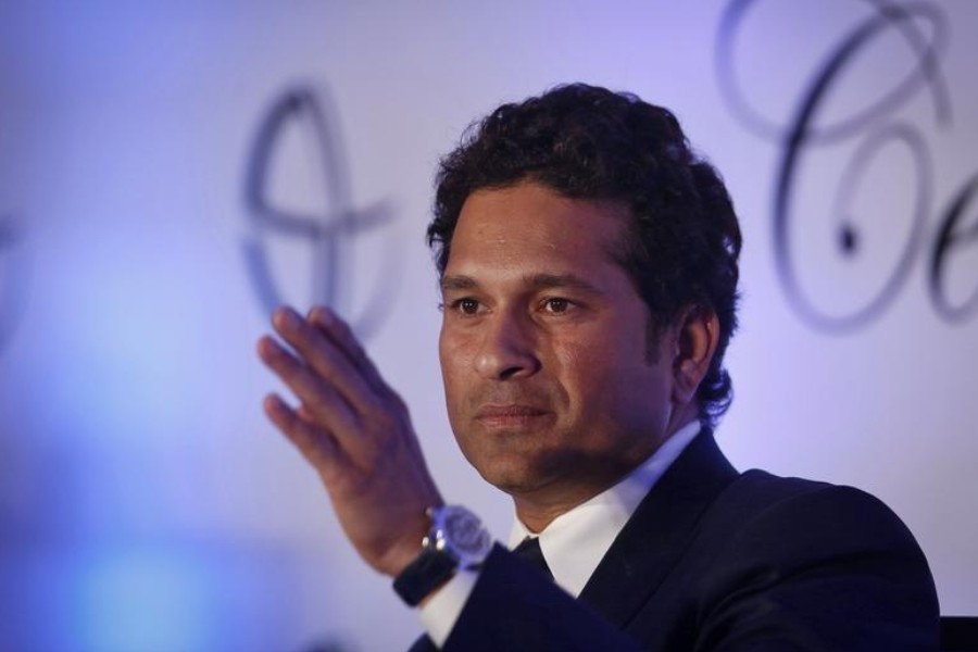 File Photo: Sachin Tendulkar gestures as he speaks during a news conference a day after his retirement in Mumbai November 17, 2013. REUTERS/Danish Siddiqui