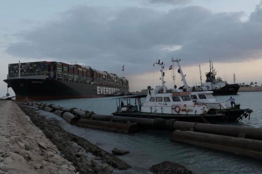 Stranded ship Ever Given, one of the world's largest container ships, is seen after it ran aground, in Suez Canal, Egypt on March 28, 2021 — Suez Canal Authority/Handout via Reuters