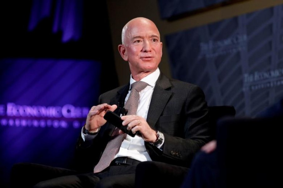 Amazon's Bezos, Tesla's Musk top Forbes' record-setting billionaire list