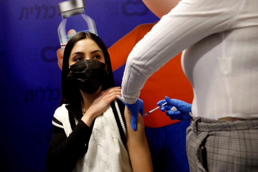 A woman receives a vaccination against the coronavirus disease (Covid-19) at a temporary Clalit healthcare maintenance organisation (HMO) centre, in Herzliya, Israel, February 3, 2021 — Reuters/Files