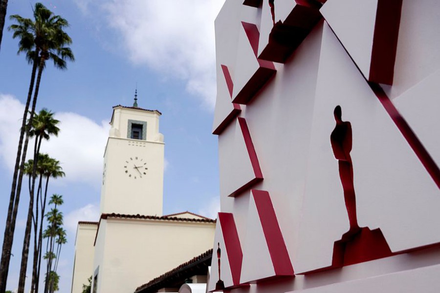 An Oscar statue design on a red carpet backdrop is pictured at Union Station, one of the locations for the 93rd Academy Awards in Los Angeles, California, US on April 24, 2021 — Pool via Reuters