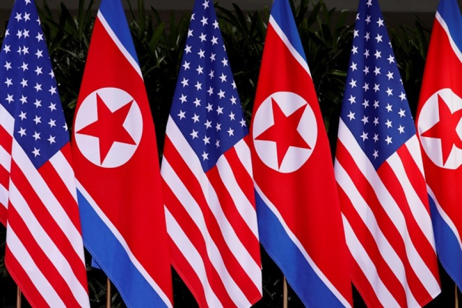 US and North Korean national flags are seen at the Capella Hotel on Sentosa island in Singapore — Reuters/Files