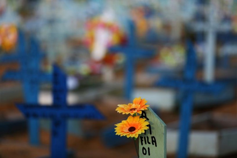 Flowers are seen on the grave of a person who passed away due to the coronavirus disease (Covid-19) at the Parque Taruma cemetery in Manaus, Brazil on May 20, 2021 — Reuters photo