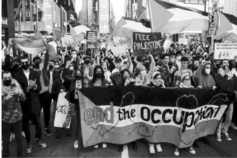 Demonstrators march on Times Square in New York city to express their solidarity with the Palestinians.  --Reuters photo