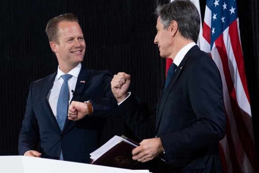 US Secretary of State Antony Blinken and Danish Foreign Minister Jeppe Kofod elbow bump at the end of a joint news conference following meetings at the Danish Foreign Ministry in Copenhagen, Denmark, May 17, 2021 — Reuters/Files