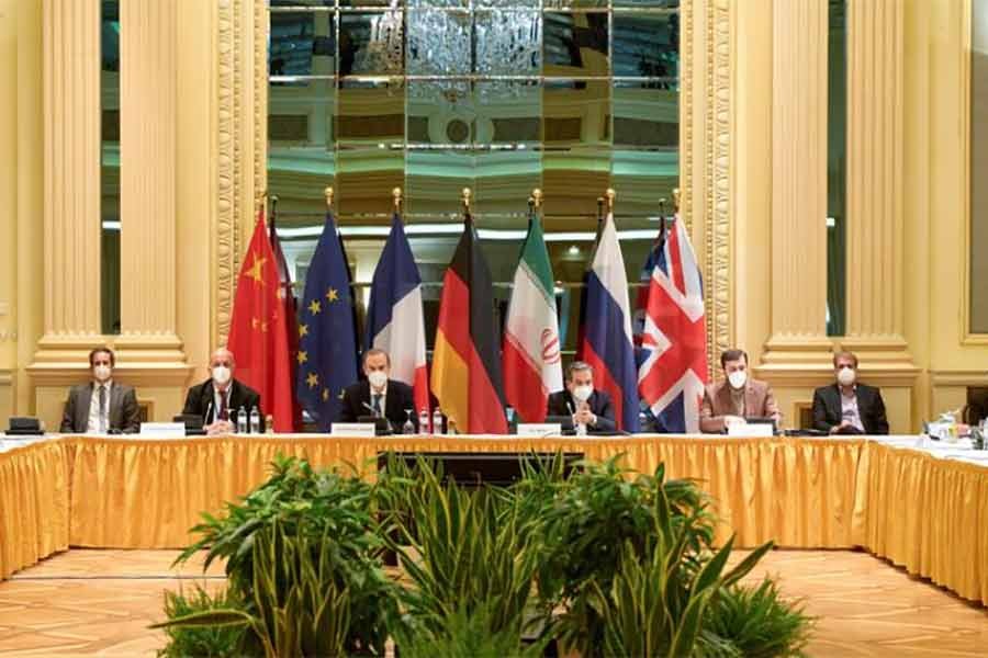 European External Action Service (EEAS) Deputy Secretary-General Enrique Mora and Iranian Deputy at Ministry of Foreign Affairs Abbas Araghchi waiting for the start of a meeting of the JCPOA Joint Commission in Vienna on April 17 this year -Reuters file photo