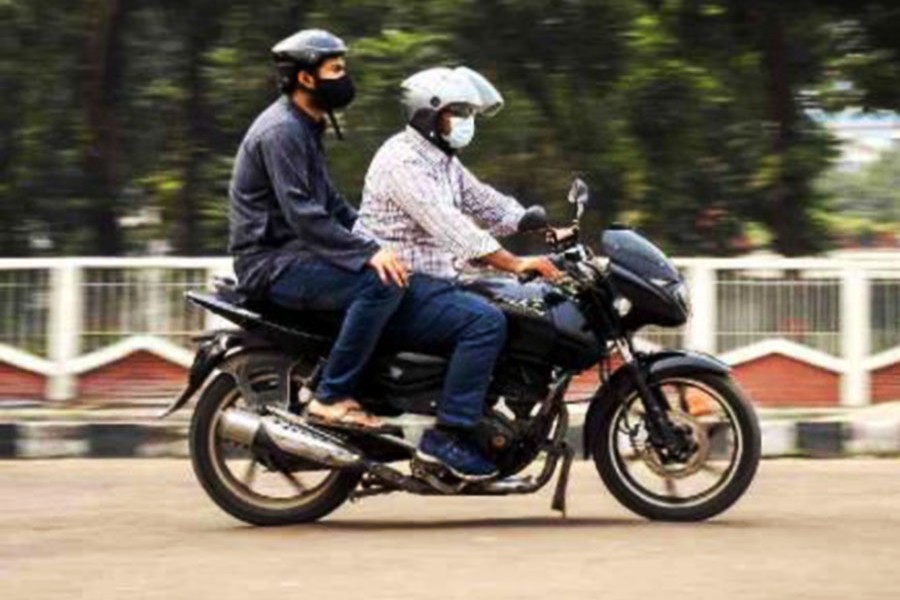 DMP bans pillion passengers during lockdown