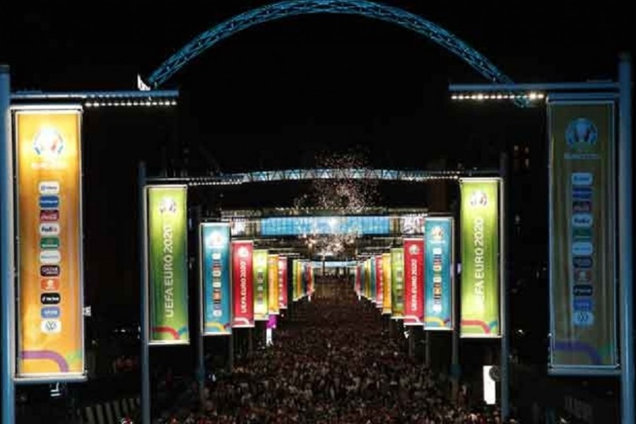 Euro 2020 - Semi Final - England v Denmark - Wembley Stadium, London, Britain - July 7, 2021 England fans are seen outside the stadium after the match Pool via REUTERS/Andrew Couldridge