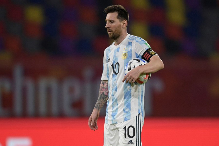 Argentina's Lionel Messi before scoring their first goal from the penalty spot during the clash against Chile — Pool via Reuters/Files