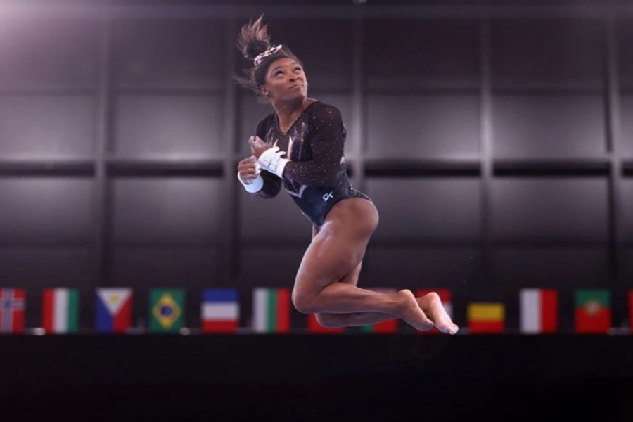 Tokyo 2020 Olympics - Gymnastics Artistic Training - Ariake Gymnastics Centre, Tokyo, Japan - July 22, 2021 Simone Biles of the United States on the uneven bars during training REUTERS/Mike Blake