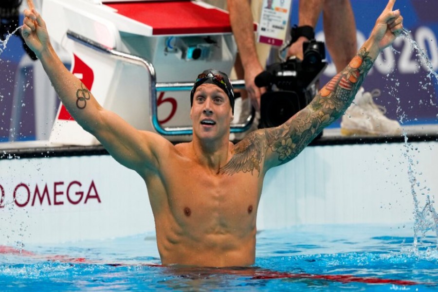 Caeleb Dressel, of the United States, celebrates after winning the men’s 100-meter freestyle final at the 2020 Summer Olympics, Thursday, July 29, 2021, in Tokyo, Japan. (AP Photo/Martin Meissner)