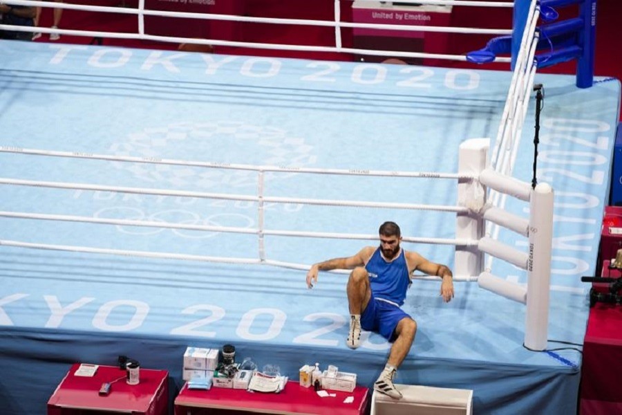 Eliad Mourad, of France refuses to leave the ring after losing a men's super heavyweight over 91-kg boxing match against Britain's Frazer Clarke at the 2020 Summer Olympics, Sunday, Aug 1, 2021, in Tokyo, Japan — AP Photo