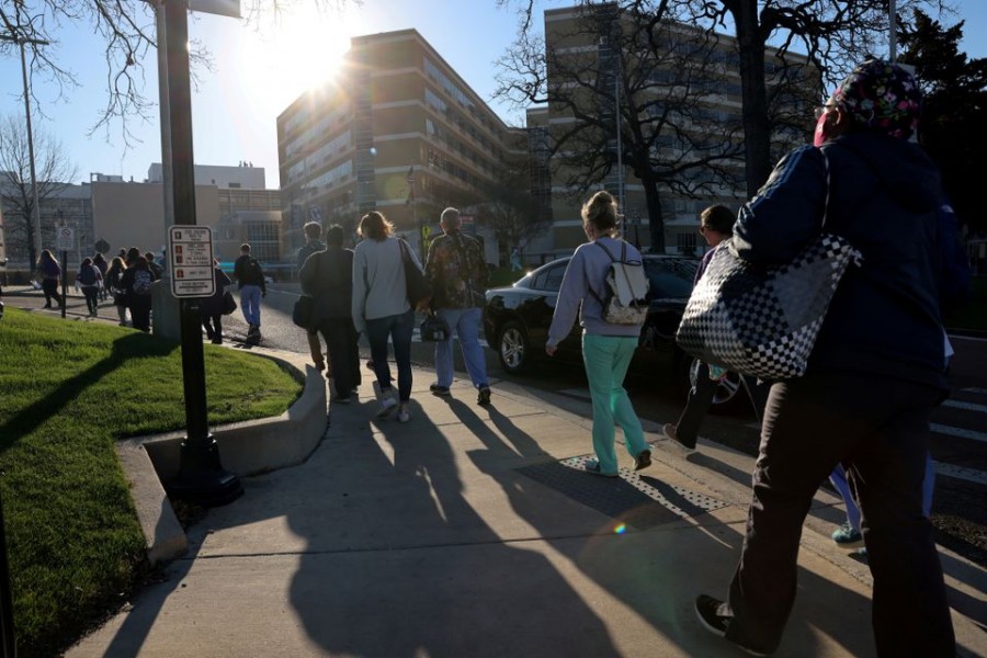 Health care workers arrive for the morning shift at the University of Mississippi Medical Center, in the state capital of one of the first US states to declare themselves fully open after a year of lockdowns, and closures during the coronavirus disease (Covid-19) outbreak in Jackson, Mississippi, US on March 9, 2021 — Reuters/Files