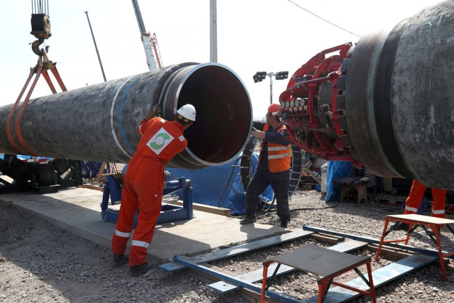 Workers are seen at the construction site of the Nord Stream 2 gas pipeline, near the town of Kingisepp, Leningrad region, Russia, June 5, 2019. REUTERS/Anton Vaganov/File photo