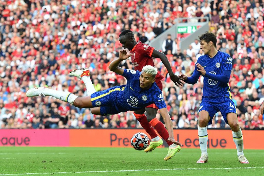 Chelsea's Thiago Silva and Andreas Christensen in action with Liverpool's Sadio Mane — Reuters photo