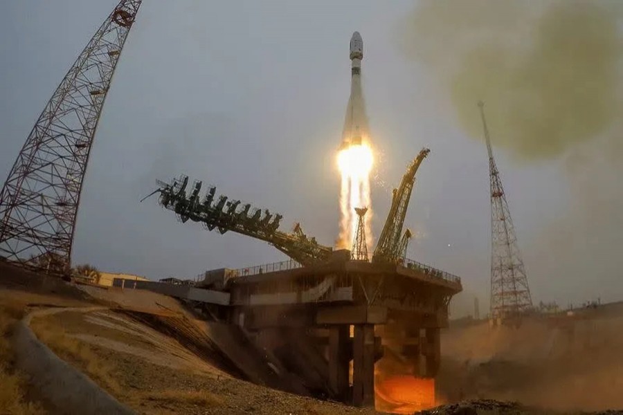 A rocket with 38 satellites blasts off from a launchpad at the Baikonur Cosmodrom