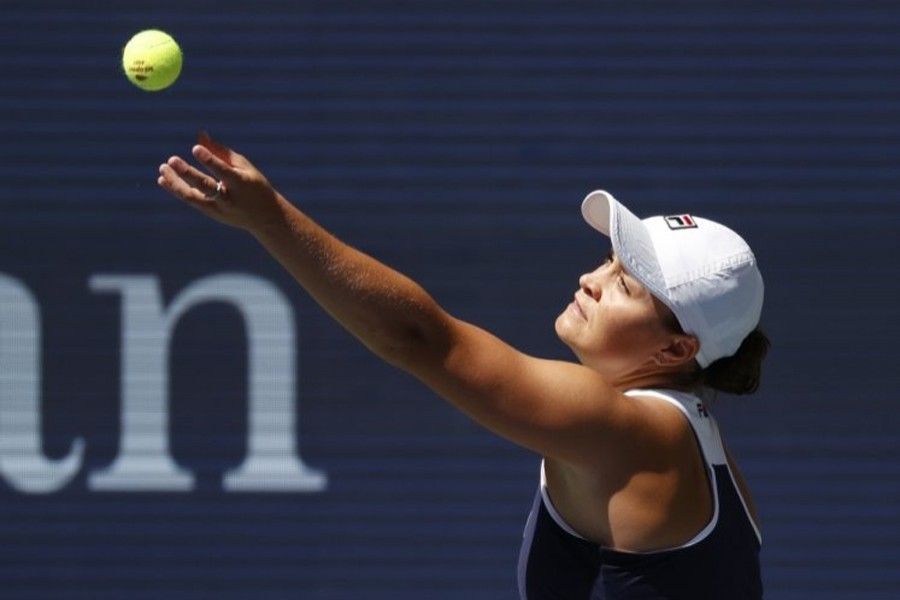 Ashleigh Barty of Australia serves against Clara Tauson of Denmark in a second round match on day four of the 2021 U.S. Open tennis tournament at USTA Billie Jean King National Tennis Center — USA TODAY Sports